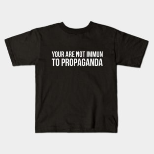YOUR ARE NOT IMMUN TO PROPAGANDA funny saying quote Kids T-Shirt